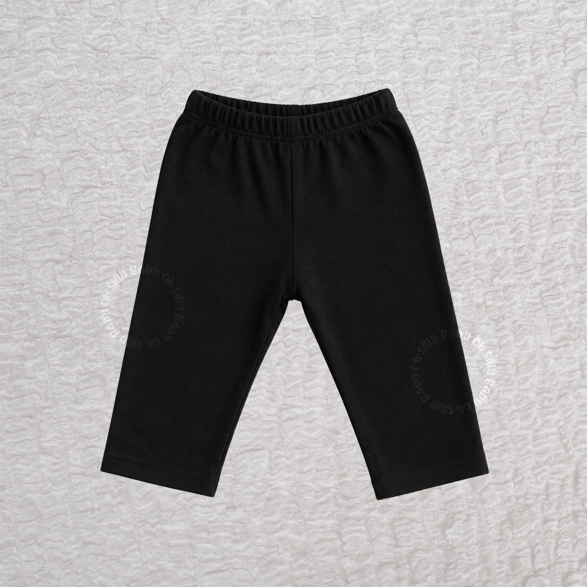 Black baby cotton pants made from 100% cotton interlock knit fabric with an elastic waistband
