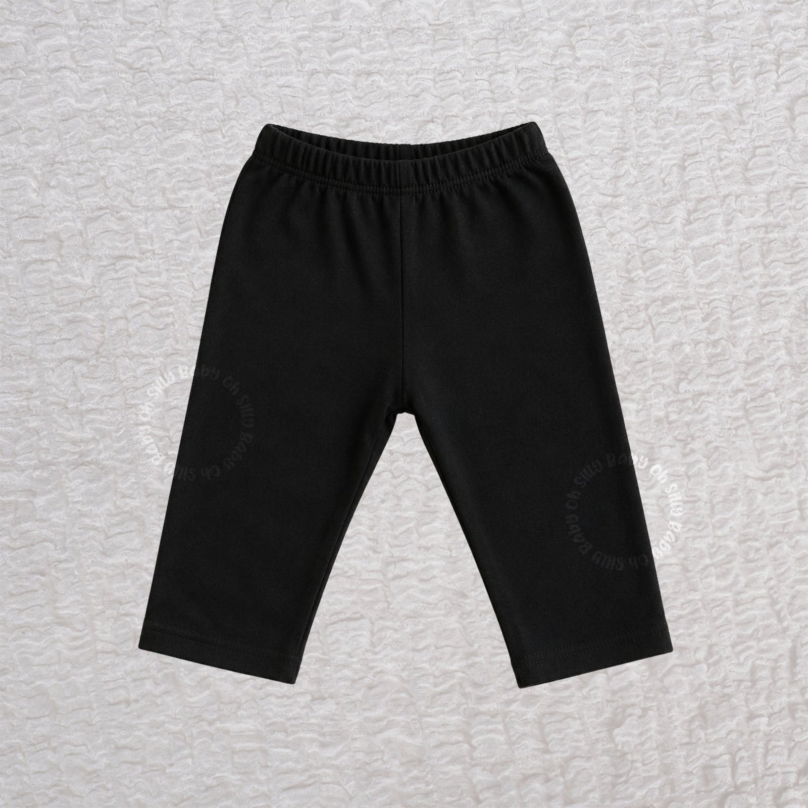 Black baby cotton pants made from 100% cotton interlock knit fabric with an elastic waistband