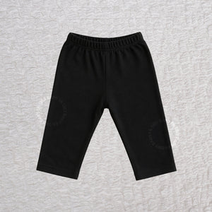Black baby cotton pants made from 100% cotton interlock knit fabric with an elastic waistband