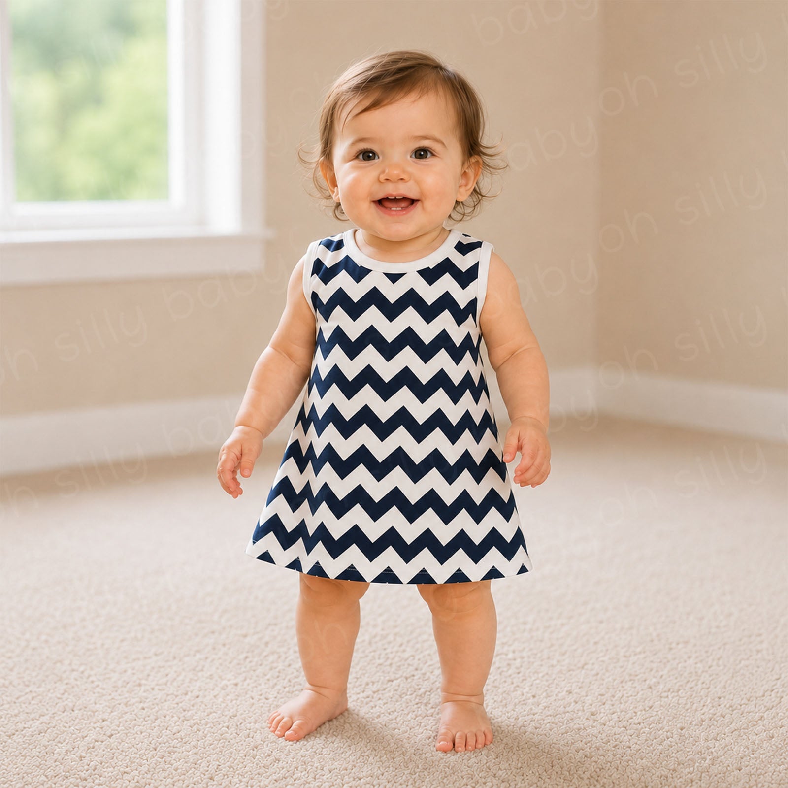 Toddler girl wearing a blue and white chevron print dress
