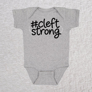 Cleftstrong short sleeve baby bodysuit in heather gray with black #cleftstrong design