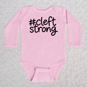 Cleftstrong long sleeve baby bodysuit in pink with black #cleftstrong design