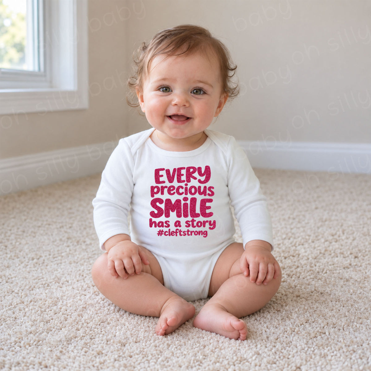 Every Precious Smile Has A Story baby wearing white long sleeve bodysuit with hot pink glitter #cleftstrong design