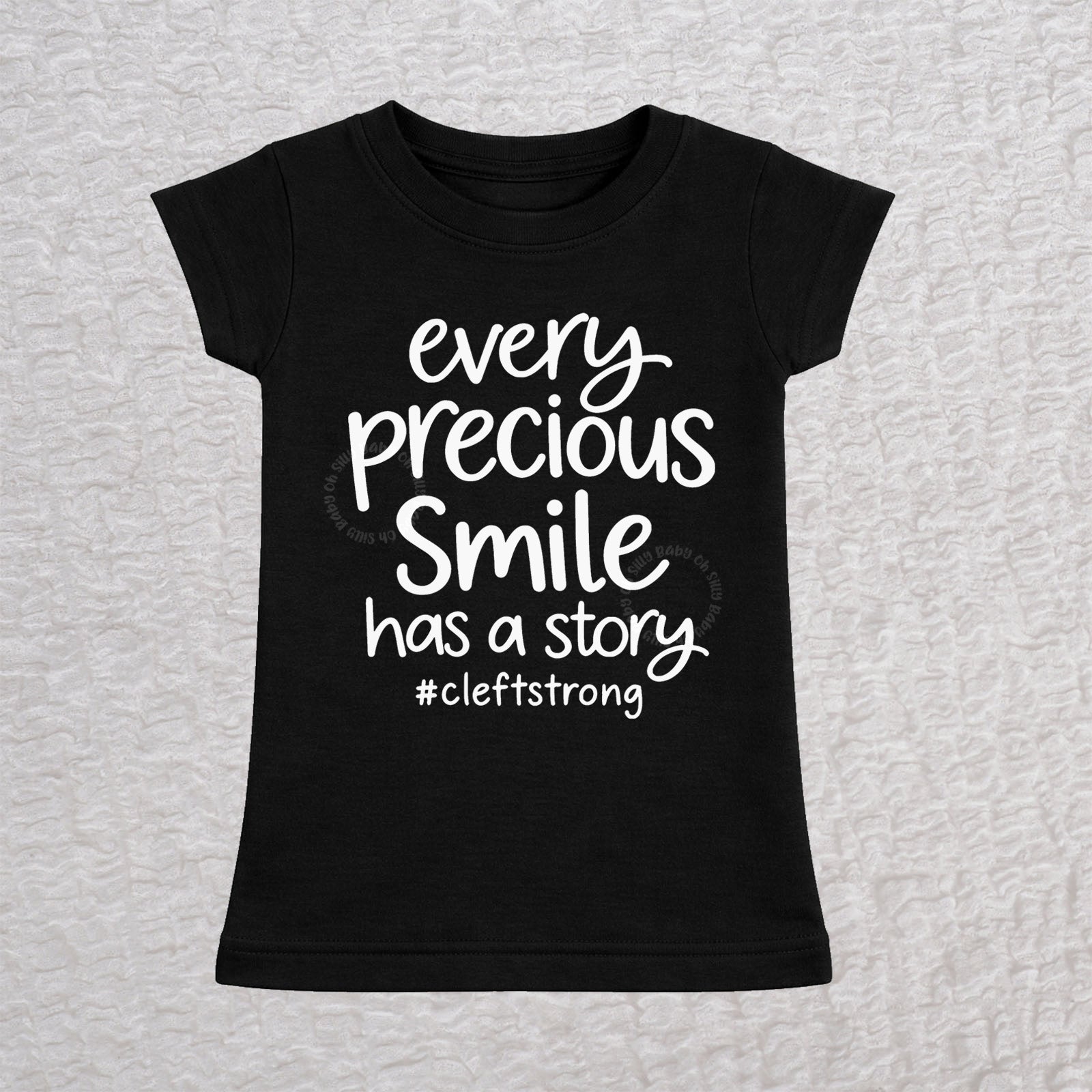 Every Precious Smile Has A Story toddler girls fit T-shirt in black with white #cleftstrong design
