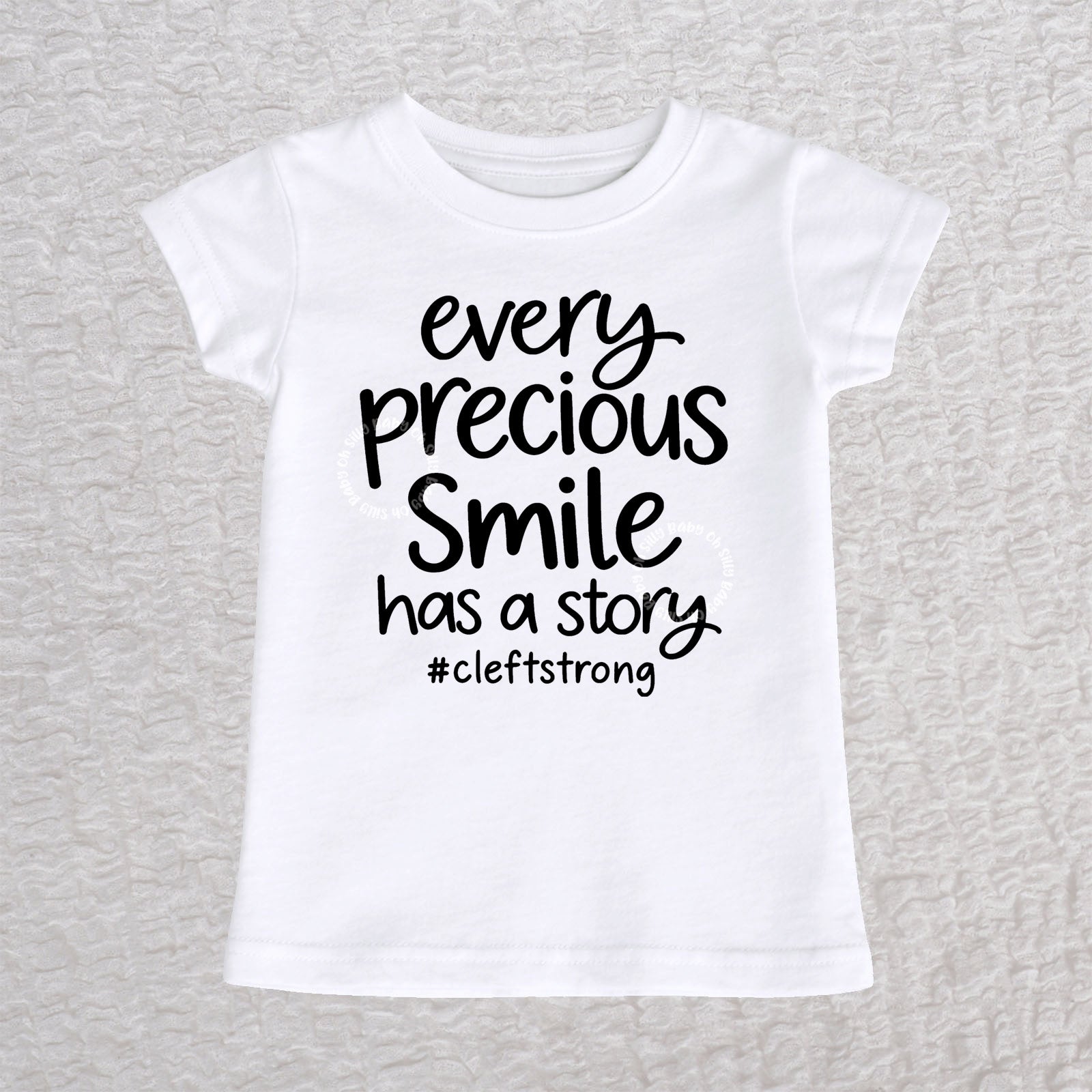 Every Precious Smile Has A Story toddler girls fit T-shirt in white with black #cleftstrong design