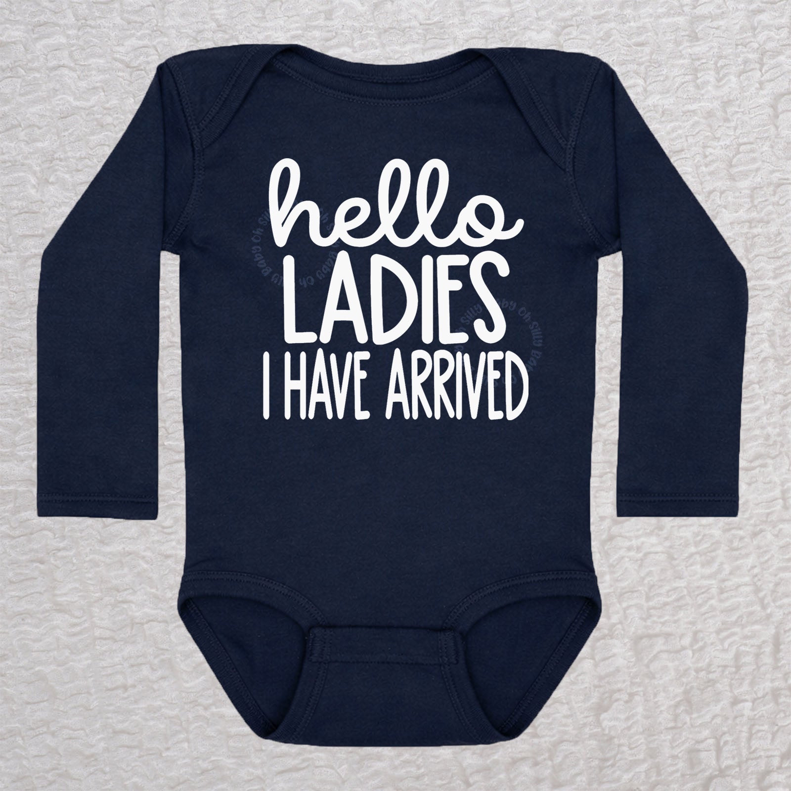 Hello Ladies I Have Arrived long sleeve baby bodysuit in navy with playful typography design