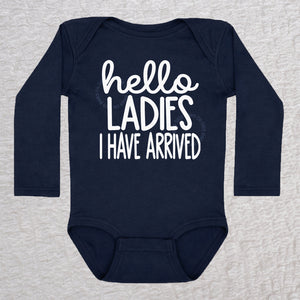 Hello Ladies I Have Arrived long sleeve baby bodysuit in navy with playful typography design