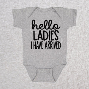 Hello Ladies I Have Arrived baby bodysuit in heather with playful typography design