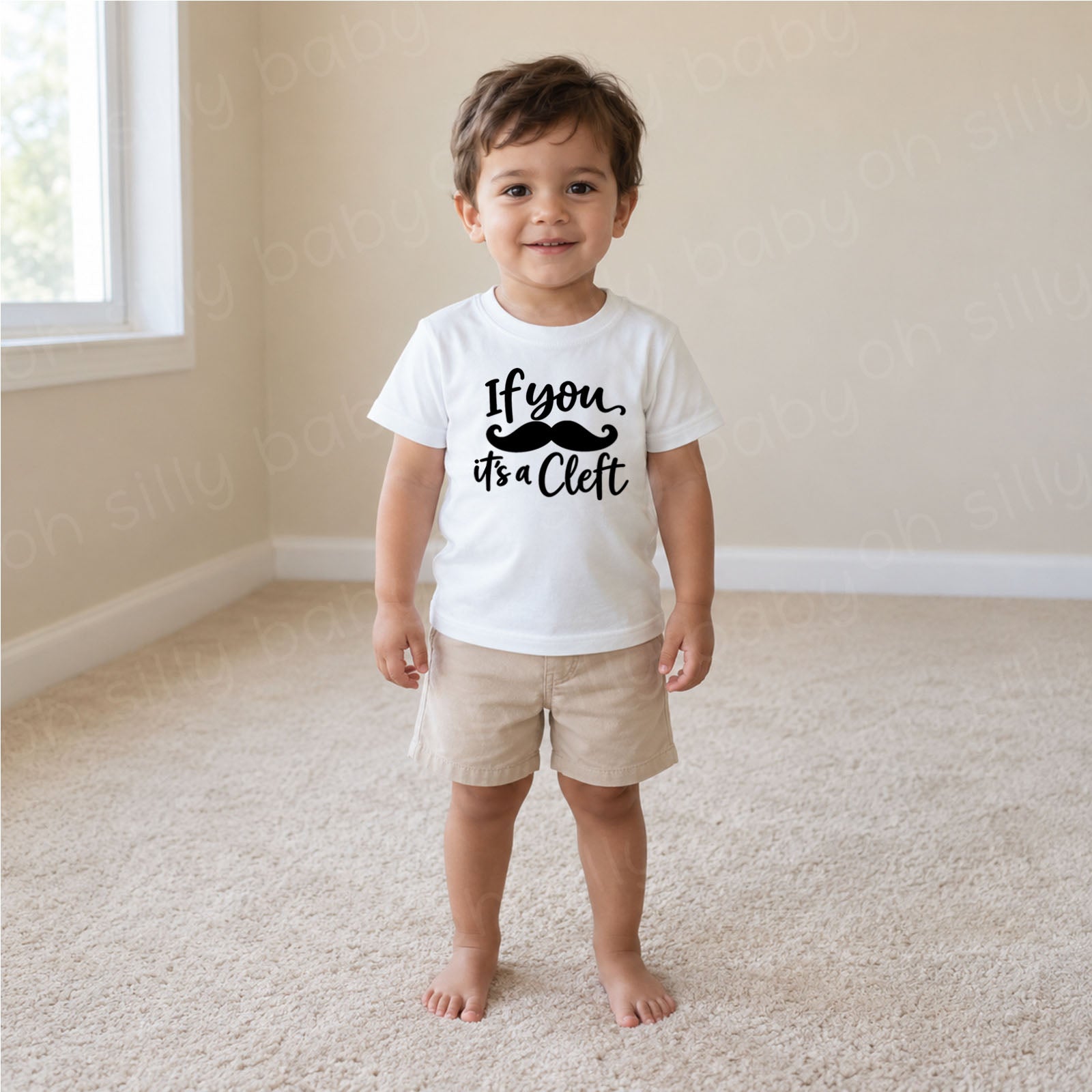 If You Mustache It's A Cleft unisex baby and toddler T-shirt in white with black mustache design
