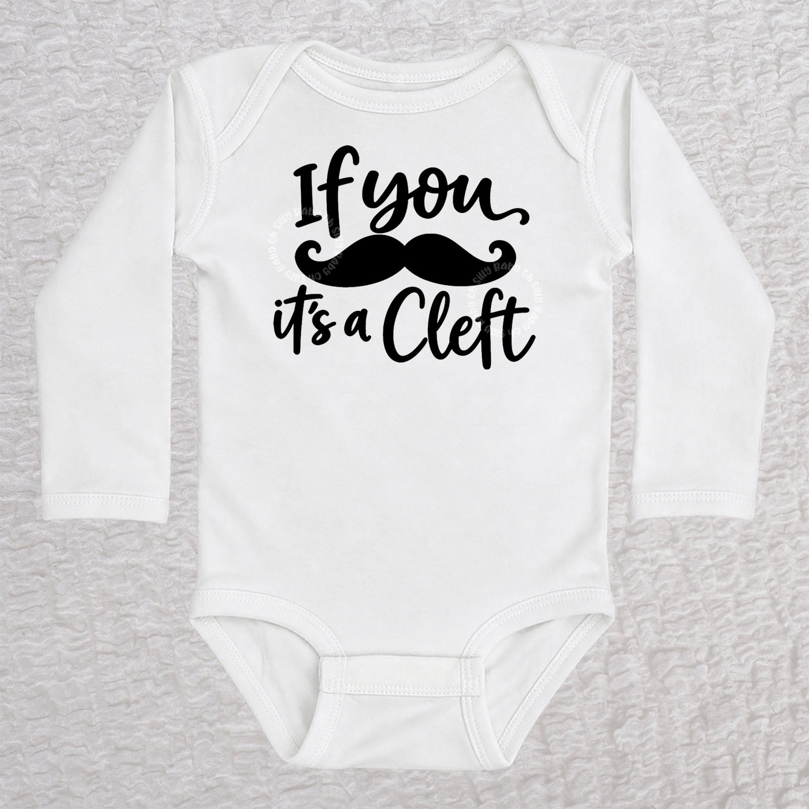If You Mustache It's A Cleft long sleeve baby bodysuit in white with black mustache design