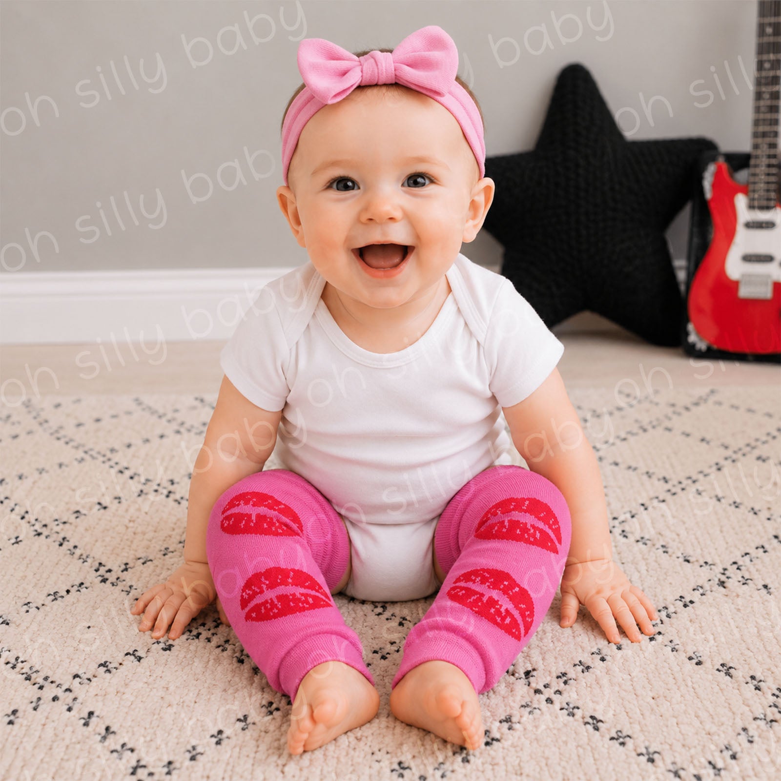 Baby wearing a white short sleeve bodysuit with Kisses baby leg warmers