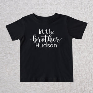 Personalized little brother toddler t-shirt in black with white lettering and custom name