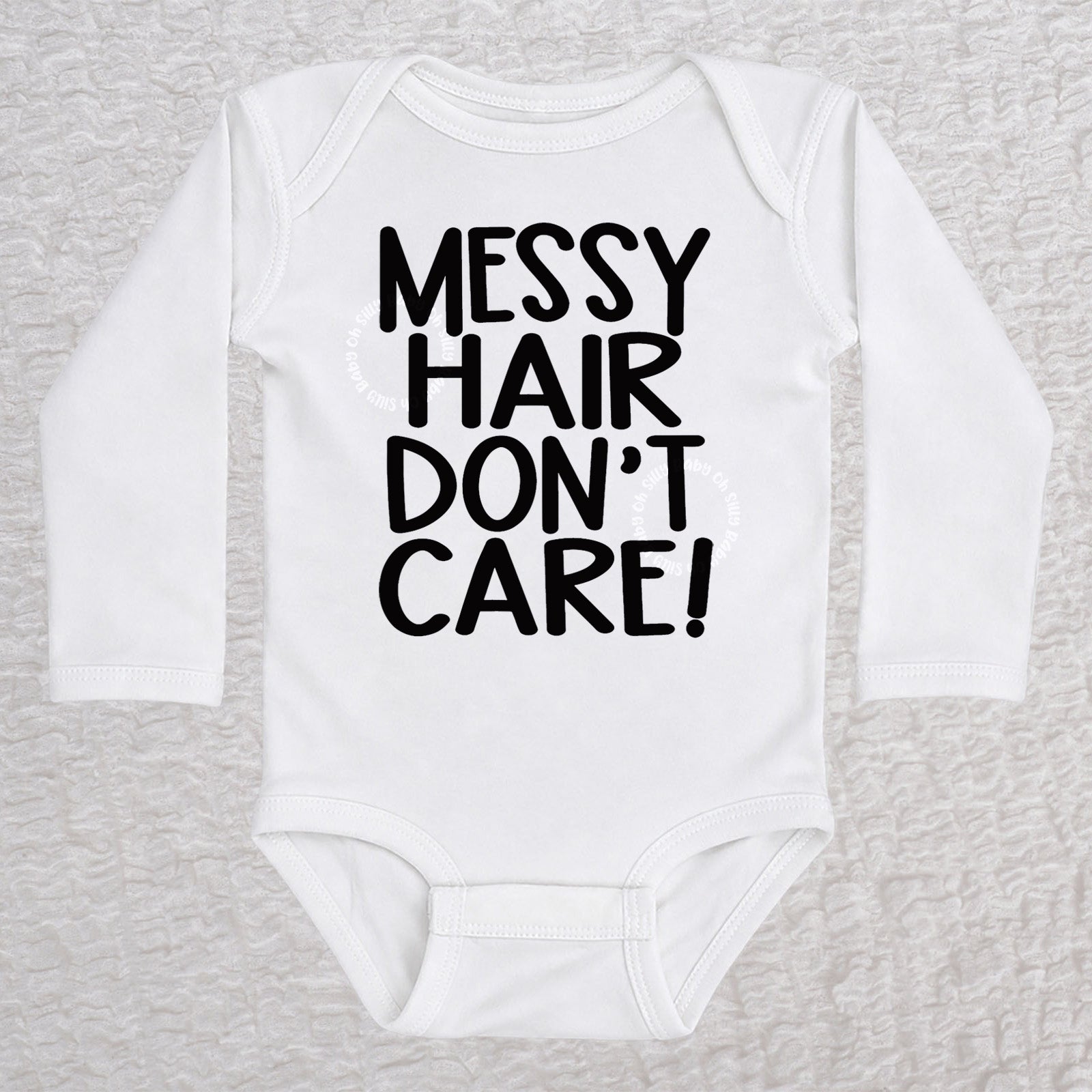 Messy Hair Don't Care long sleeve baby bodysuit in white with playful typography design