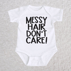 Messy Hair Don't Care short sleeve baby bodysuit in white with playful typography design