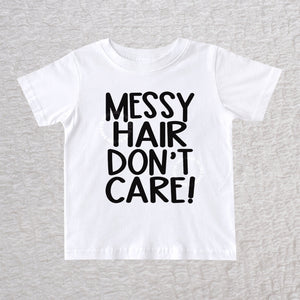 Messy Hair Don't Care unisex baby and toddler t-shirt in white with playful typography design