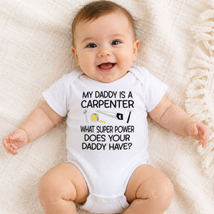 Smiling baby wearing My Daddy Is a Carpenter personalized white baby bodysuit