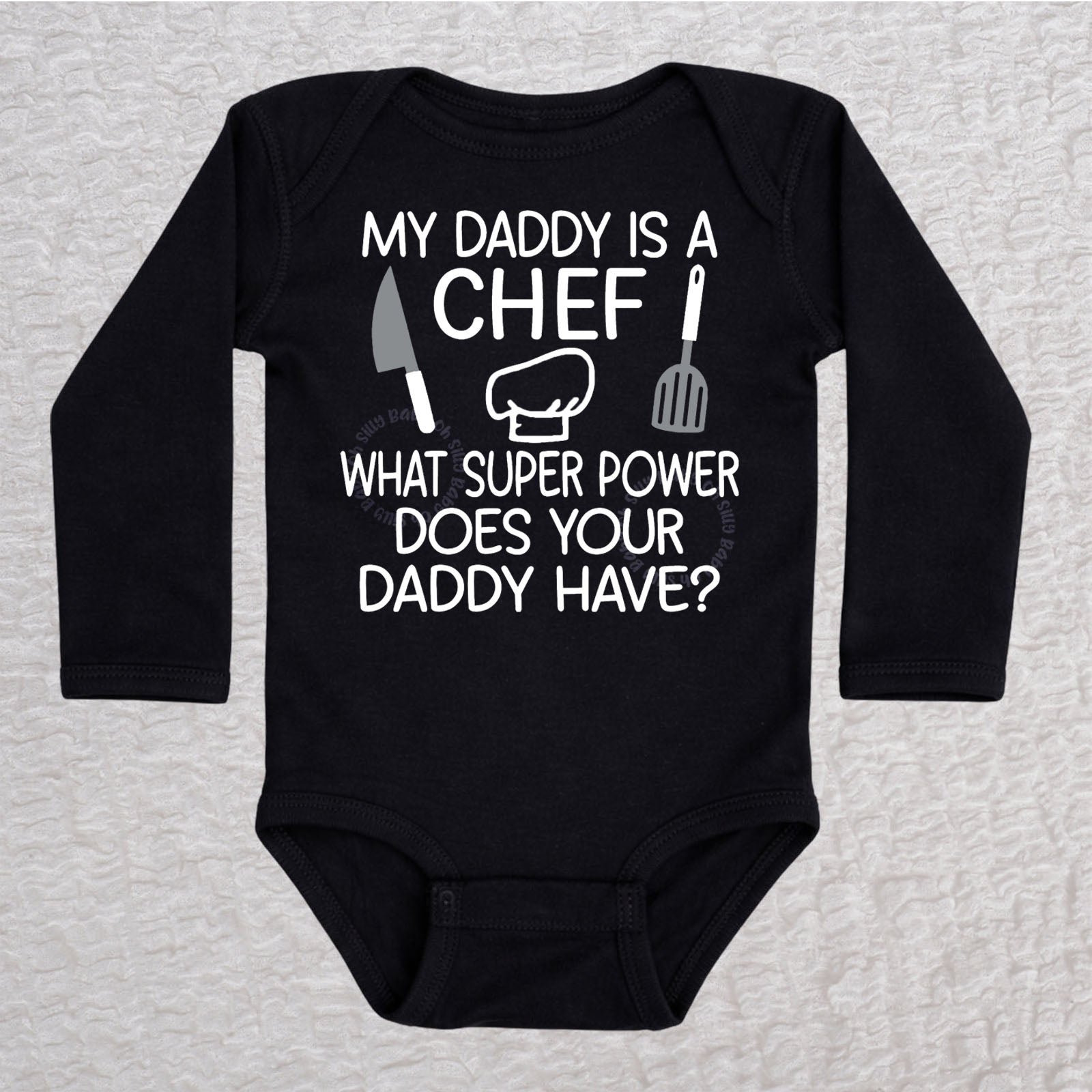 My Daddy Is a Chef long sleeve baby bodysuit in black with chef hat, knife and spatula design
