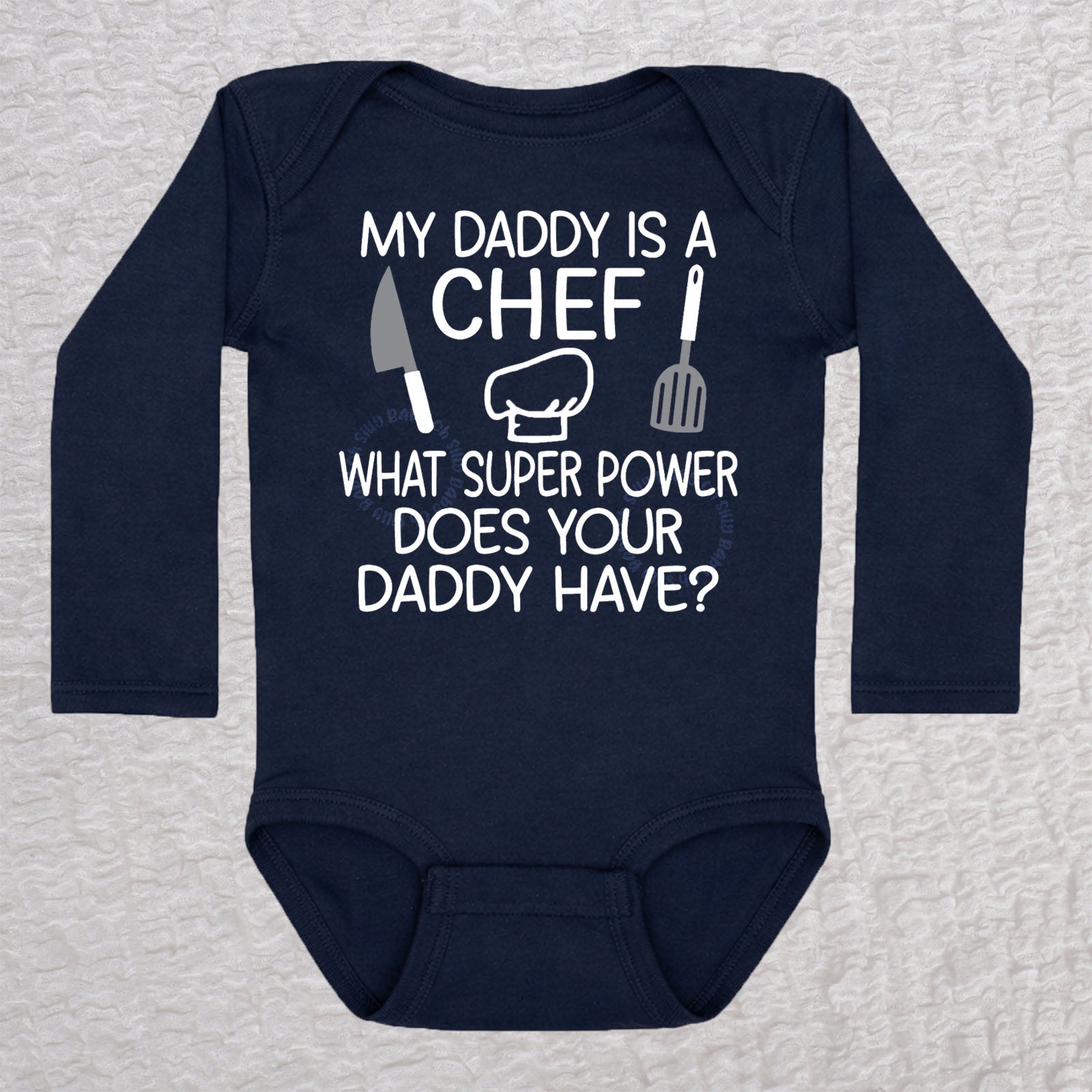 My Daddy Is a Chef long sleeve baby bodysuit in navy with chef hat, knife and spatula design