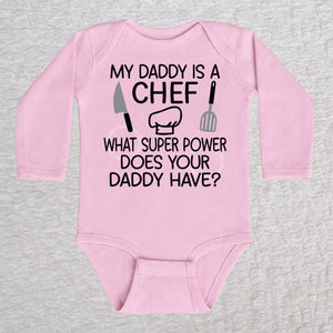 My Daddy Is a Chef long sleeve baby bodysuit in pink with chef hat, knife and spatula design