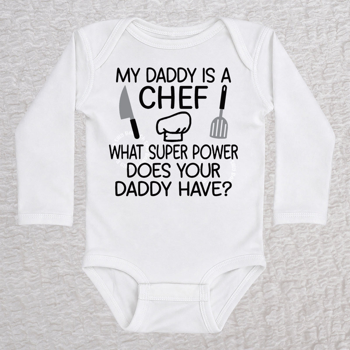 My Daddy Is a Chef long sleeve baby bodysuit in white with chef hat, knife and spatula design