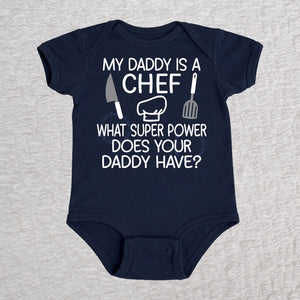 My Daddy Is a Chef short sleeve baby bodysuit in navy with chef hat, knife and spatula design