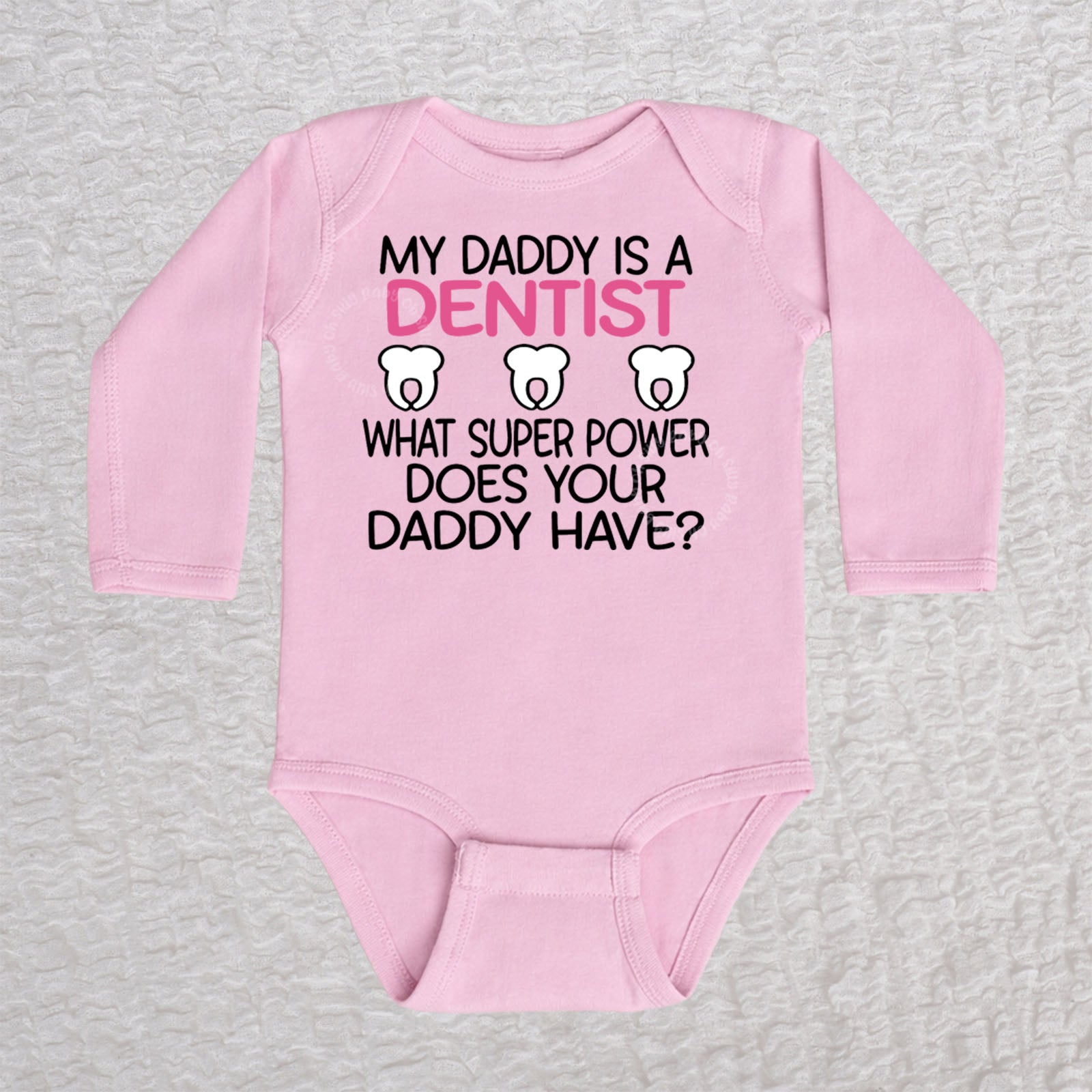 My Daddy Is a Dentist long sleeve baby bodysuit in pink featuring a tooth design
