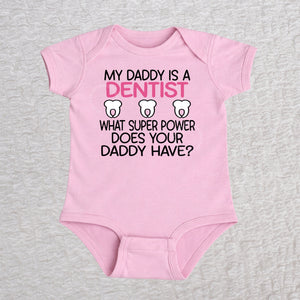 My Daddy Is a Dentist short sleeve baby bodysuit in pink featuring a tooth design