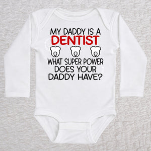 My Daddy Is a Dentist long sleeve baby bodysuit in white featuring a tooth design