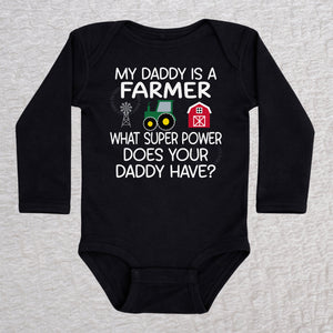My Daddy Is a Farmer long sleeve baby bodysuit in black with tractor, barn, and windmill design