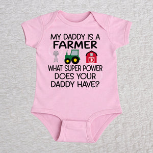 My Daddy Is a Farmer short sleeve baby bodysuit in pink with tractor, barn, and windmill design