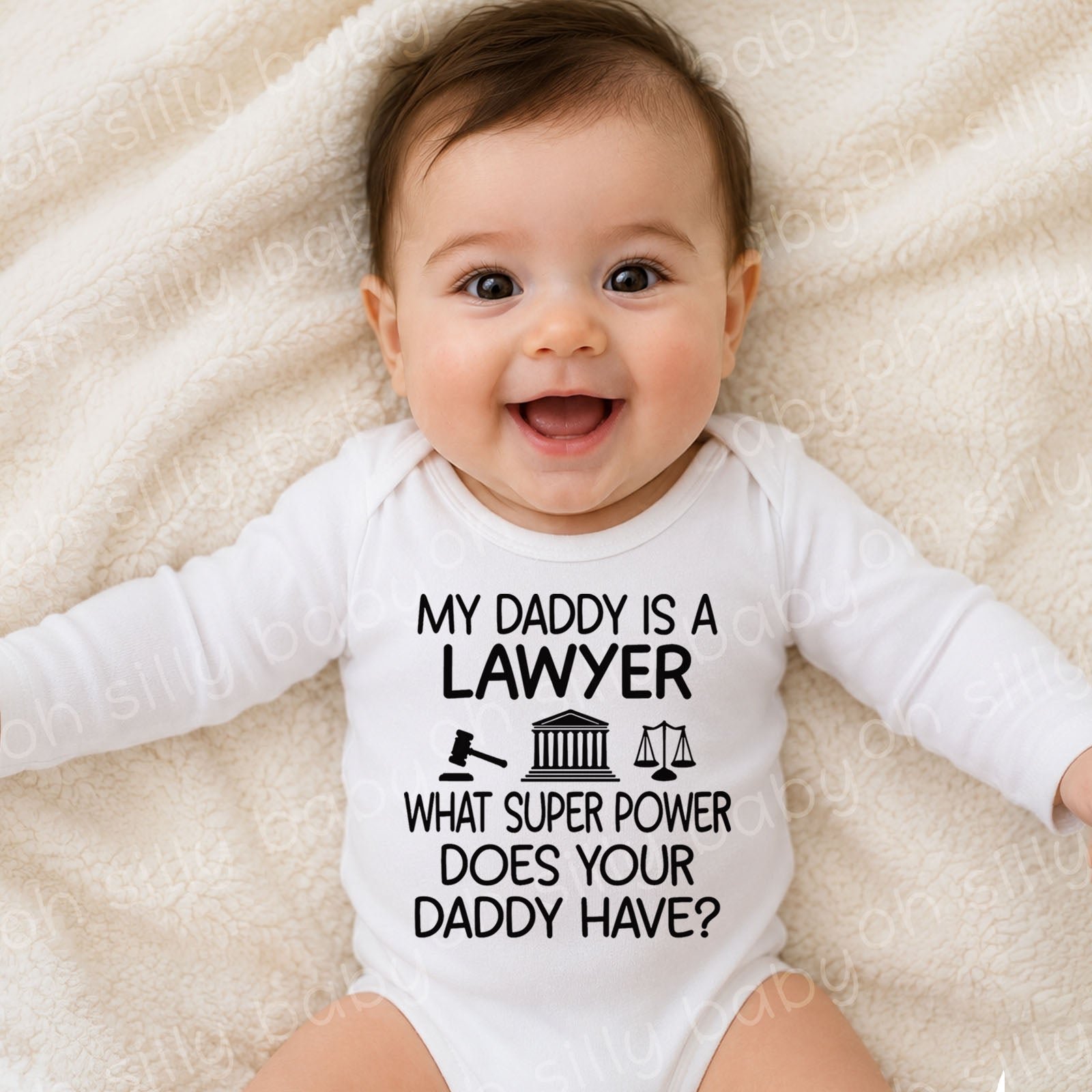 Baby wearing a My Daddy Is a Lawyer long sleeve baby bodysuit featuring a gavel, courthouse, and scales of justice design