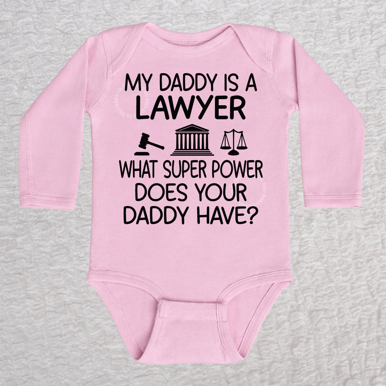 My Daddy Is a Lawyer long sleeve baby bodysuit in pink featuring a gavel, courthouse, and scales of justice design