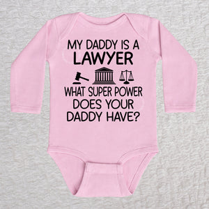 My Daddy Is a Lawyer long sleeve baby bodysuit in pink featuring a gavel, courthouse, and scales of justice design