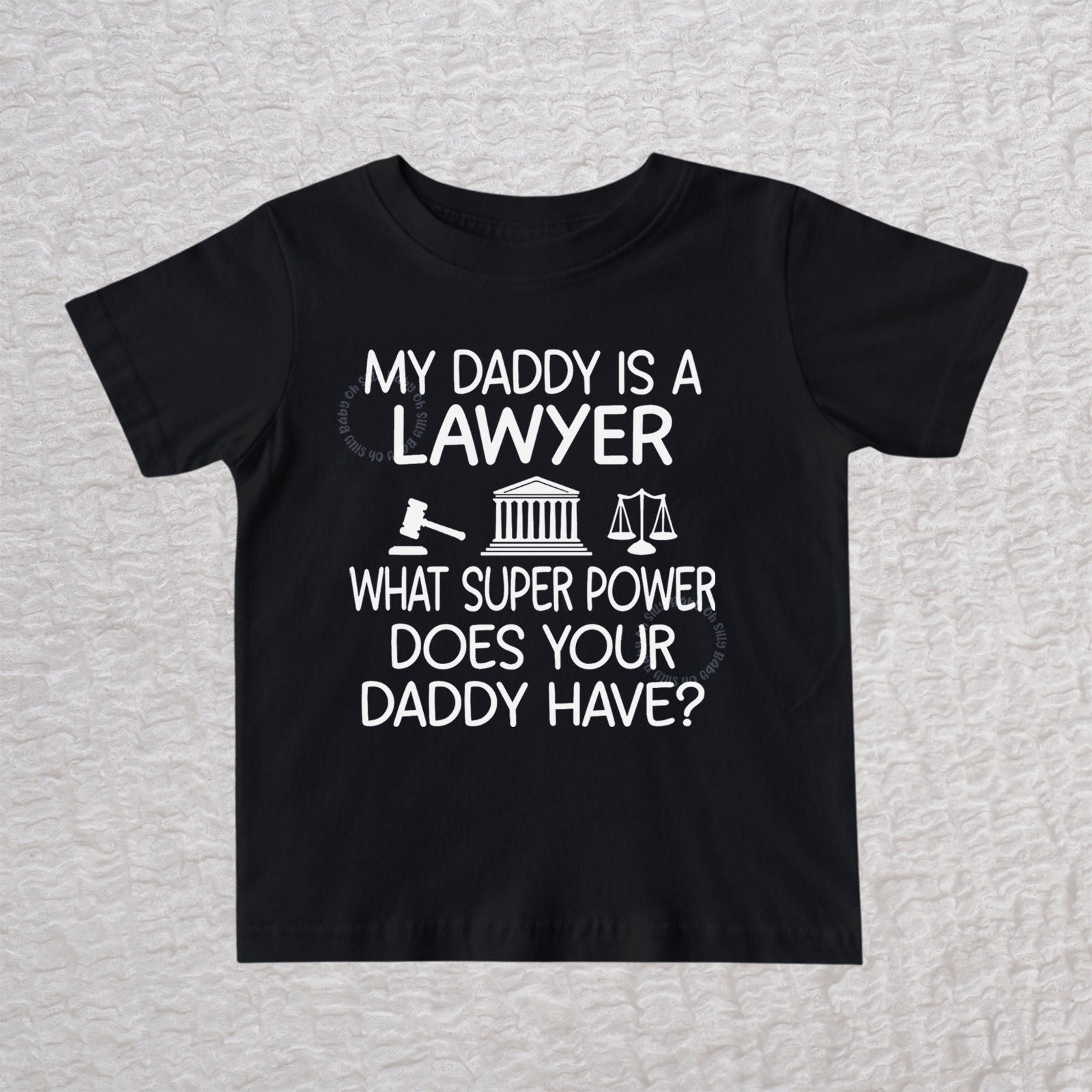 My Daddy Is a Lawyer unisex baby and toddler t-shirt in black featuring a gavel, courthouse, and scales of justice design
