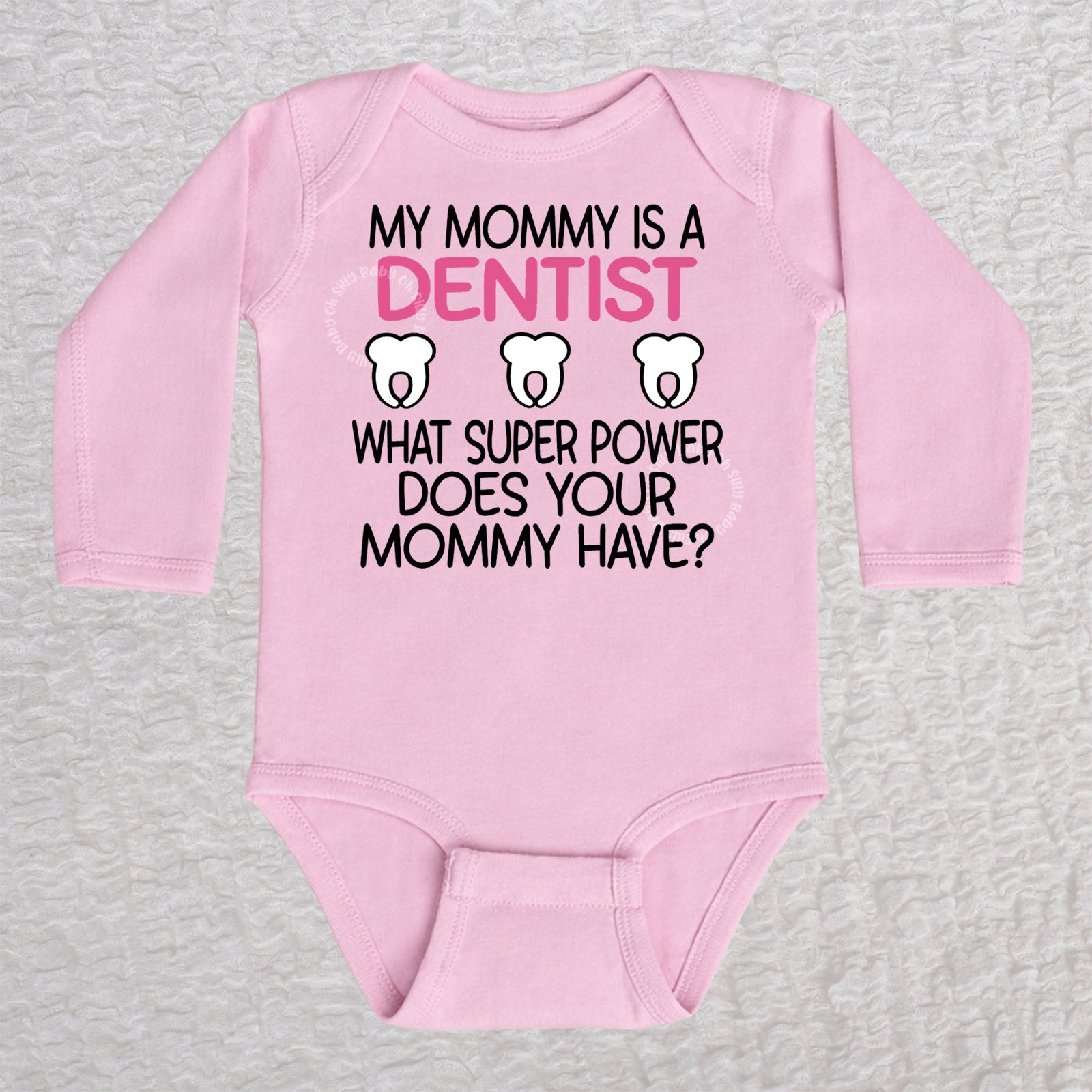 My Mommy Is a Dentist long sleeve baby bodysuit in pink featuring a tooth design