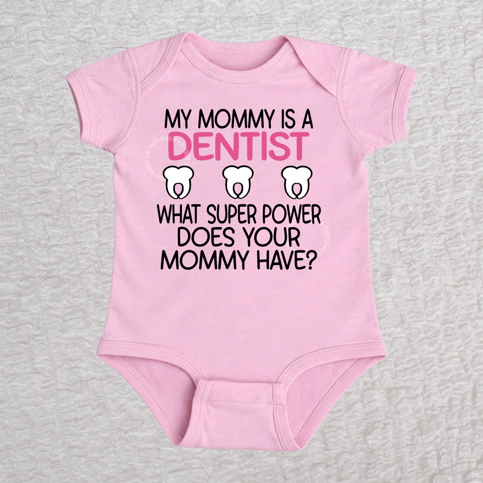 My Mommy Is a Dentist short sleeve baby bodysuit in pink featuring a tooth design