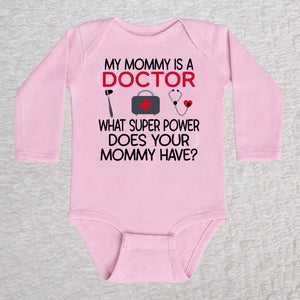 My Mommy Is a Doctor long sleeve baby bodysuit in pink featuring a reflex hammer, doctor's bag, and stethoscope design