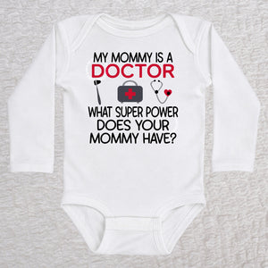 My Mommy Is a Doctor long sleeve baby bodysuit in white featuring a reflex hammer, doctor's bag, and stethoscope design