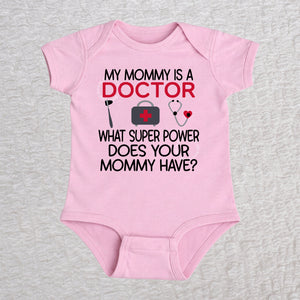 My Mommy Is a Doctor short sleeve baby bodysuit in pink featuring a reflex hammer, doctor's bag, and stethoscope design