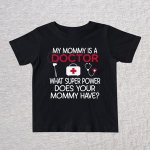 My Mommy Is a Doctor unisex baby and toddler t-shirt in black featuring a reflex hammer, doctor's bag, and stethoscope design