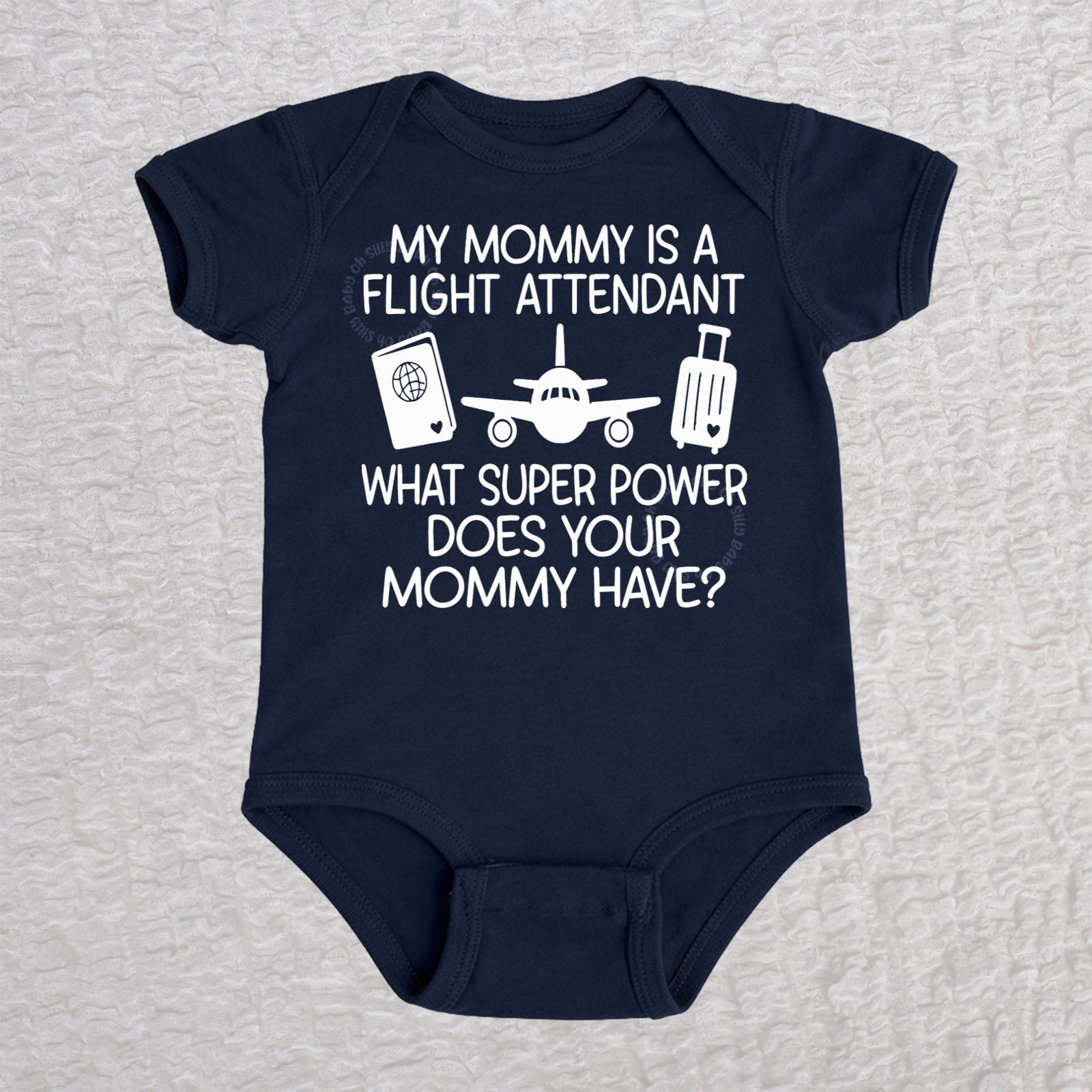 My Mommy Is a Flight Attendant short sleeve baby bodysuit in navy featuring an airplane, passport, and suitcase design