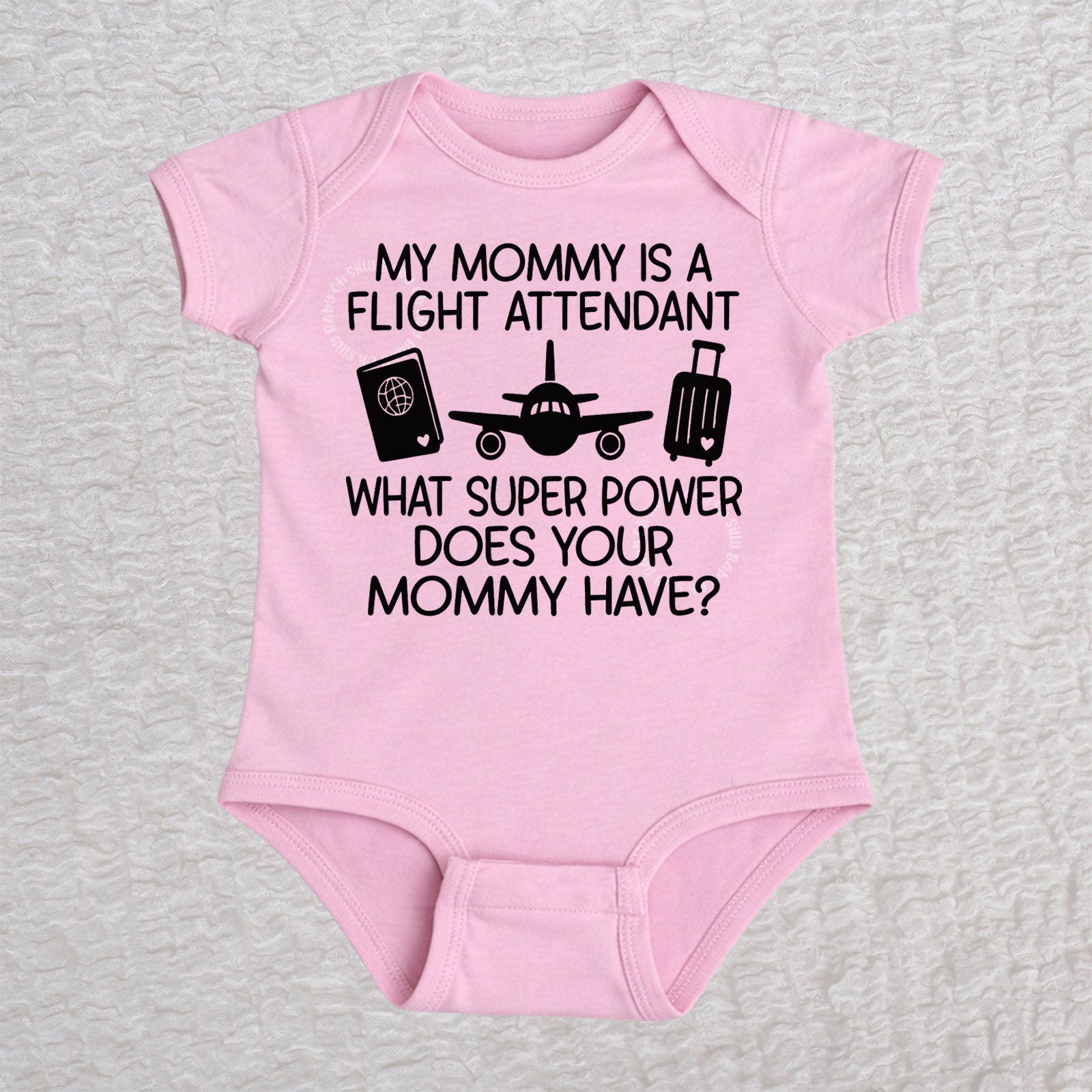 My Mommy Is a Flight Attendant short sleeve baby bodysuit in pink featuring an airplane, passport, and suitcase design