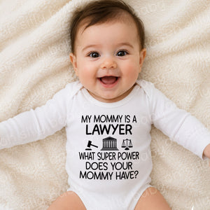 Baby wearing a My Mommy Is a Lawyer long sleeve baby bodysuit featuring a gavel, courthouse, and scales of justice design