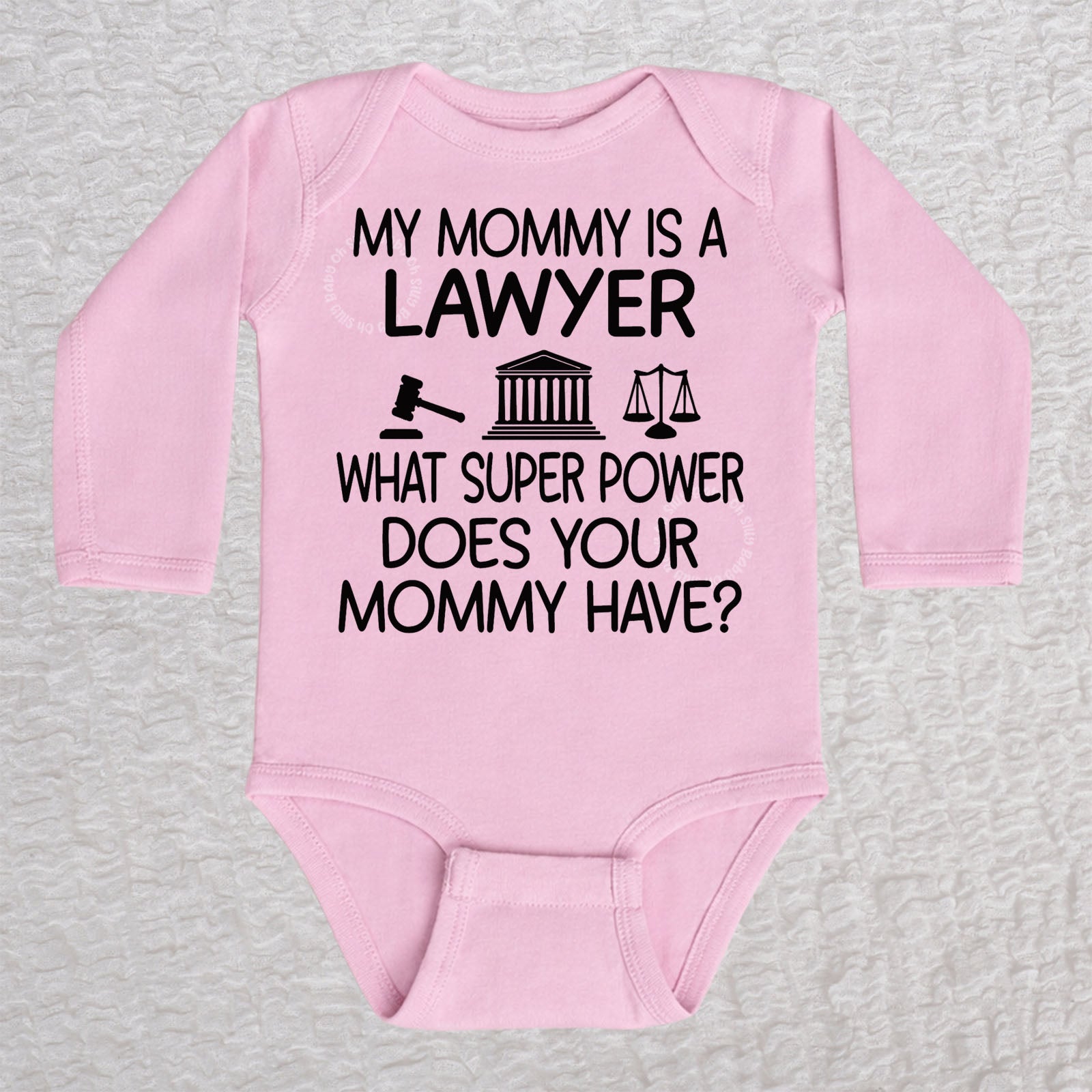 My Mommy Is a Lawyer long sleeve baby bodysuit in pink featuring a gavel, courthouse, and scales of justice design