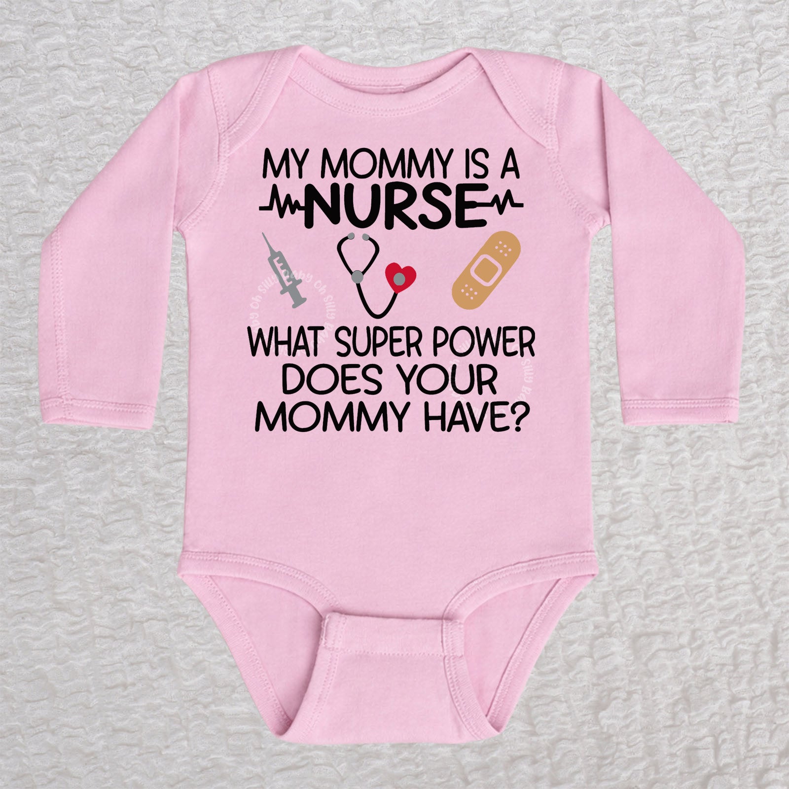 My Mommy Is a Nurse long sleeve baby bodysuit in pink with stethoscope, heartbeat line, syringe and bandage design