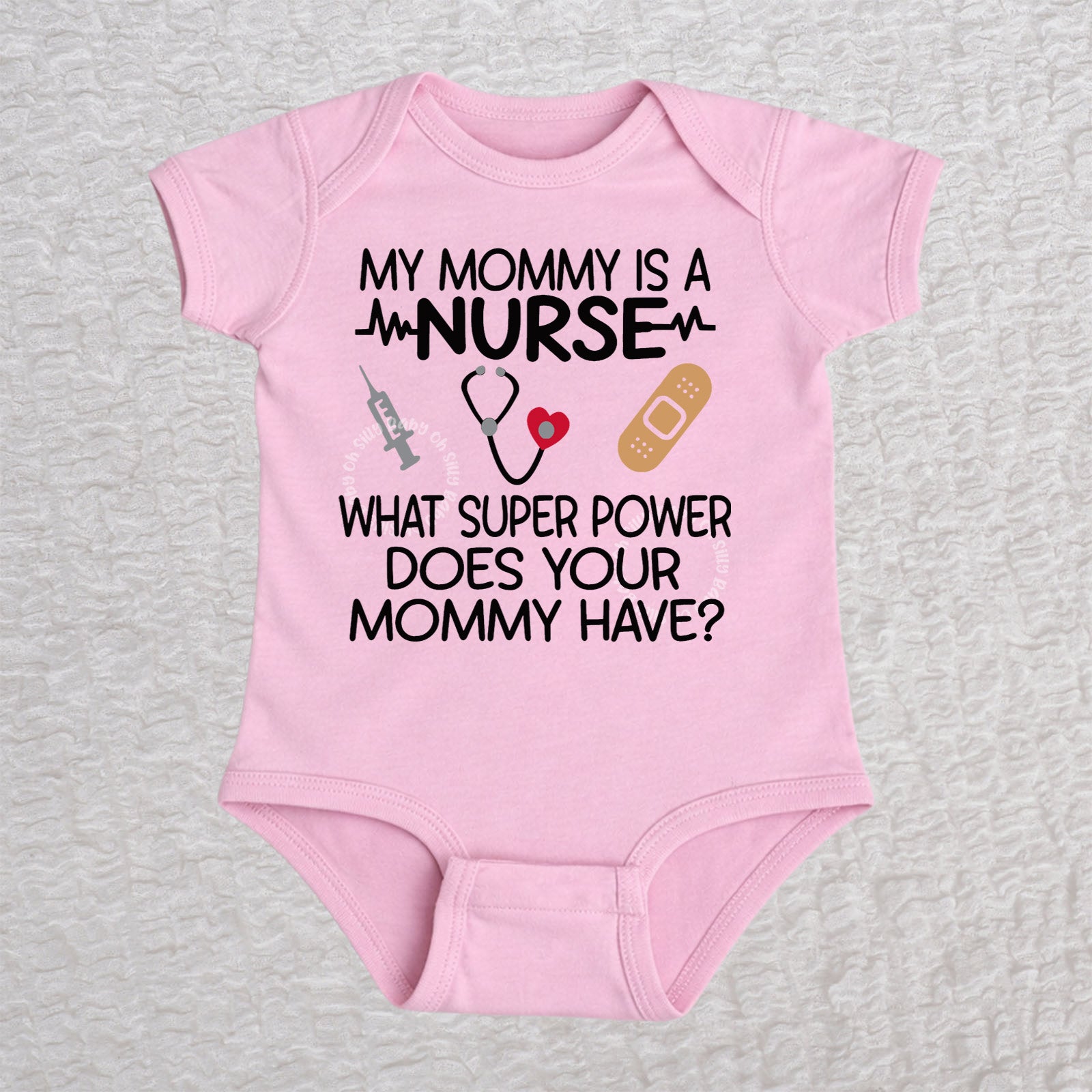 My Mommy Is a Nurse short sleeve baby bodysuit in pink with stethoscope, heartbeat line, syringe and bandage design