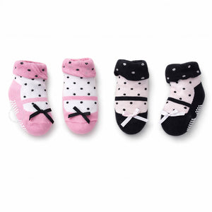 Set of two baby socks with polka dots and bows 