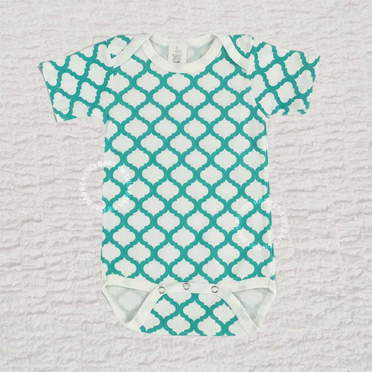 Turquoise and white Quatrefoil Print baby bodysuit made from 100% cotton interlock knit fabric
