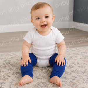 Baby wearing a white short sleeve bodysuit with Royal Blue baby leg warmers
