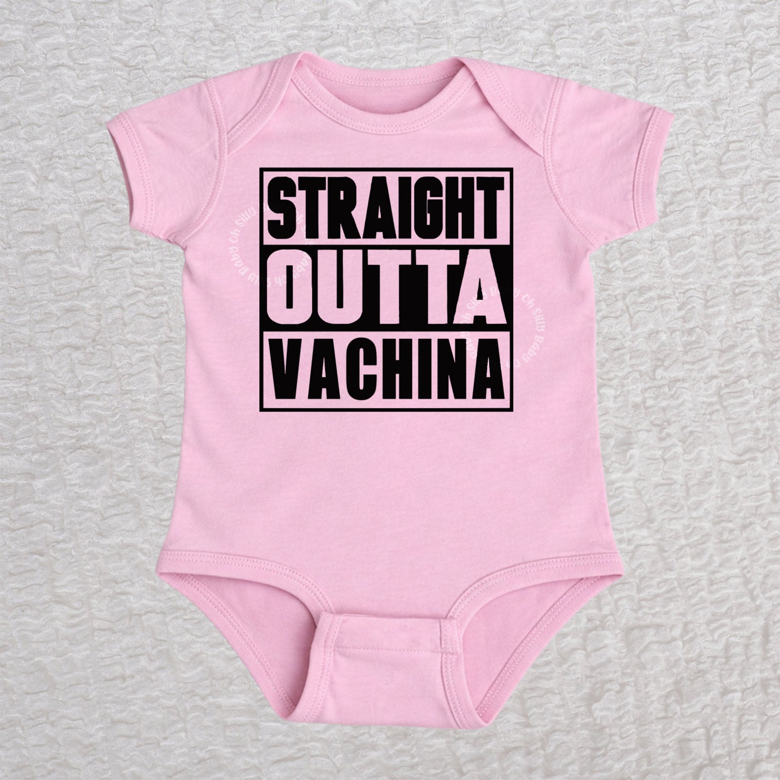 Straight Outta Vachina short sleeve baby bodysuit in pink with bold typography design
